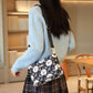 Crossbodytas met meerdere zakken en print voor dames