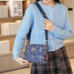 Crossbodytas met meerdere zakken en print voor dames