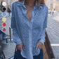 Opengewerkte witte blouse met leeg patroon
