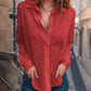 Opengewerkte witte blouse met leeg patroon