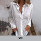 Opengewerkte witte blouse met leeg patroon