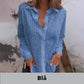 Opengewerkte witte blouse met leeg patroon