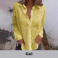 Opengewerkte witte blouse met leeg patroon