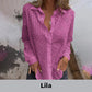 Opengewerkte witte blouse met leeg patroon