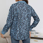 Damesjas met lange mouwen en luipaardprint en knopen