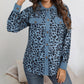 Damesjas met lange mouwen en luipaardprint en knopen