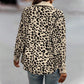 Damesjas met lange mouwen en luipaardprint en knopen