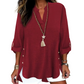 Casual top in effen kleur met knoopjes en zijsplit