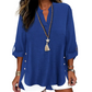 Casual top in effen kleur met knoopjes en zijsplit