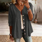 Damesblouse met V-hals, kanten rand en knopen