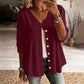 Damesblouse met V-hals, kanten rand en knopen