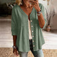 Damesblouse met V-hals, kanten rand en knopen