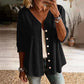 Damesblouse met V-hals, kanten rand en knopen