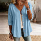 Damesblouse met V-hals, kanten rand en knopen