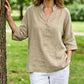 Damesblouses met halflange mouwen, knoopsluiting en V-hals