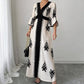 Elegante maxi-jurk met V-hals en print voor dames