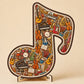 Houten puzzel met muzieknoten