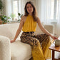 Set bestaande uit een mouwloze haltertop voor dames en een broek met luipaardprint