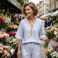 Set bestaande uit een gestreepte top met V-hals en een broek met wijde pijpen voor dames