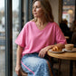 Set bestaande uit een losvallend damesshirt en een broek met luipaardprint
