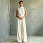 Mouwloze jumpsuit met hoge kraag en wijde pijpen voor dames