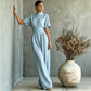 Jumpsuit met korte mouwen, hoge kraag en wijde pijpen voor dames