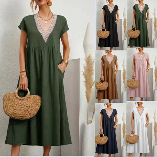 Elegante damesjurk met V-hals, korte mouwen en een losse pasvorm