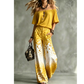 Tweedelige outfit voor dames met open schouders, in kleurverloop en met luipaardprint