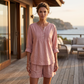 Damesblouse met lange mouwen, plooien en Henley-hals