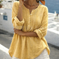 Damesblouse met lange mouwen, plooien en Henley-hals