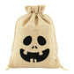 Halloween-zakjes van jute met trekkoord – Snoepzakje met griezelig gezicht