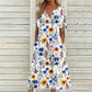 ☀️👗Topkeuze - Casual midi-jurk met bloemenprint en V-hals – soepel vallend en romantische print