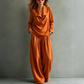 Set bestaande uit een casual top met col en een broek met wijde pijpen voor dames