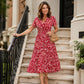 Elegante damesjurk met V-hals en bloemenprint