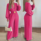Elegante jumpsuit met V-hals, wijde pijpen en riem