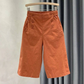 Dames hoge taille bermudabroek met knoopdetail