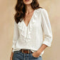 Elegante damesblouse met V-hals en ruches