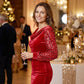 Elegante damesjurk met gedrapeerde halslijn en paillettenmouwen