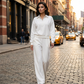 Dames set van blouse met lange mouwen en wijde pijpen broek