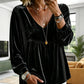 Elegant fluwelen dameshesje met V-hals