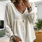 Elegant fluwelen dameshesje met V-hals