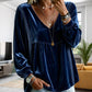 Elegant fluwelen dameshesje met V-hals