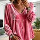 Elegant fluwelen dameshesje met V-hals