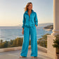 Dames set van vest met rits en wijde pijpen broek