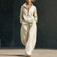 Dames set van vest met rits en wijde pijpen broek