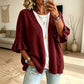 Gebreid damesvest met geplooide mouwen