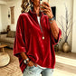 Fluwelen damesblouse met 3/4 mouwen en halve ritssluiting