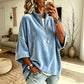 Fluwelen damesblouse met 3/4 mouwen en halve ritssluiting