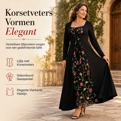 Zwarte maxi-jurk met vierkante hals, lange mouwen, veter korset en geborduurde bloemenmesh-paneel