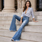 Dames high-waisted distressed flare jeans